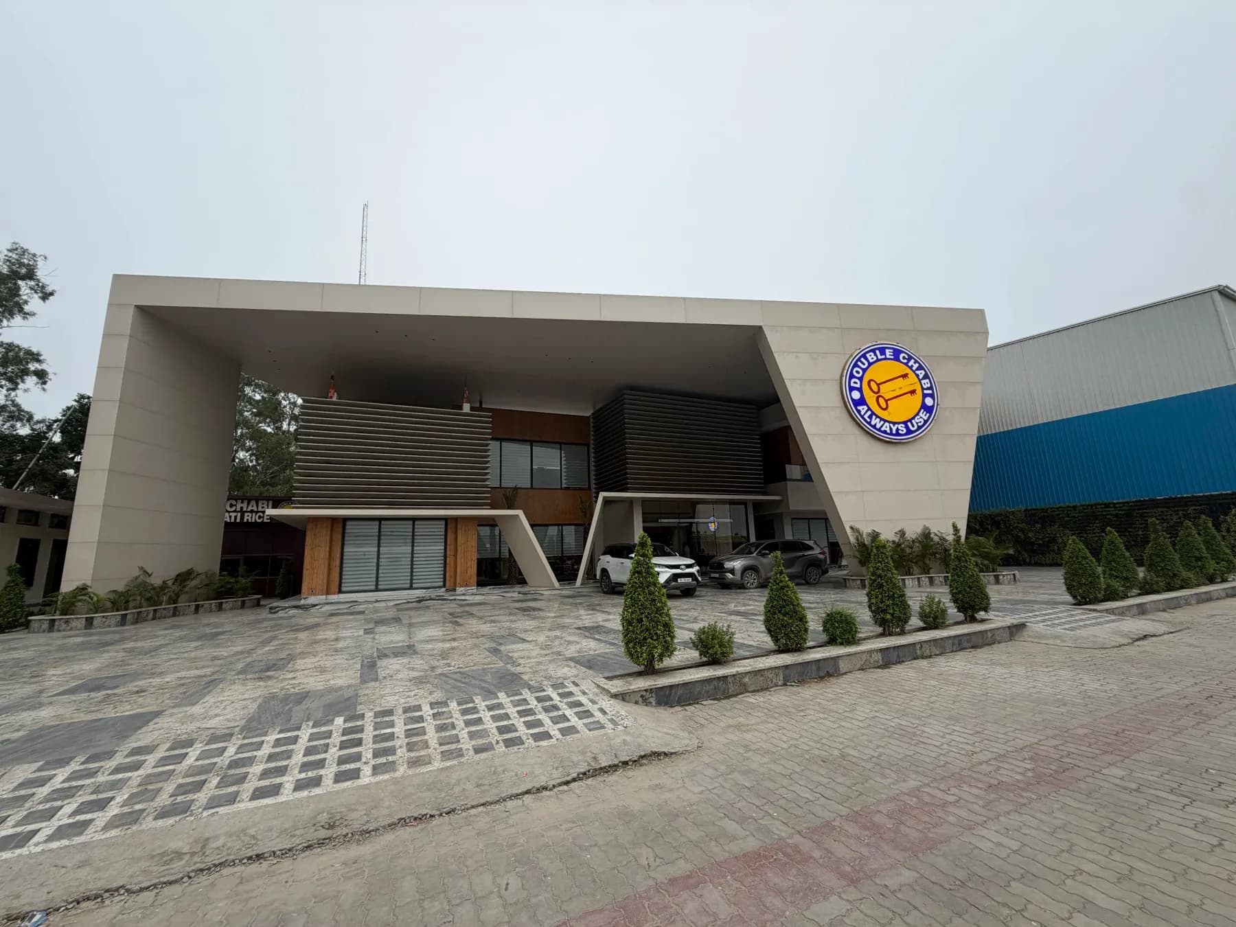 The front of the Double Chabi facility on an overcast afternoon.